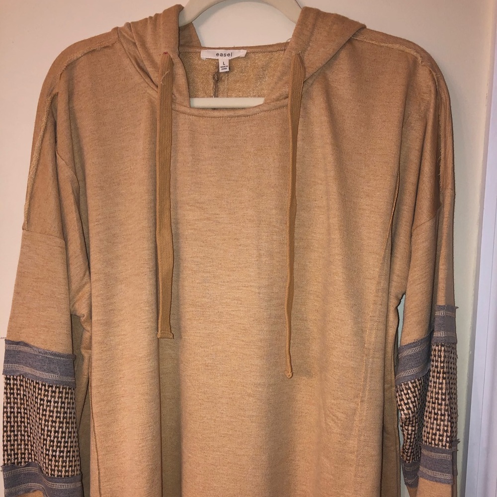 Soft Terry knit pullover hoodie.